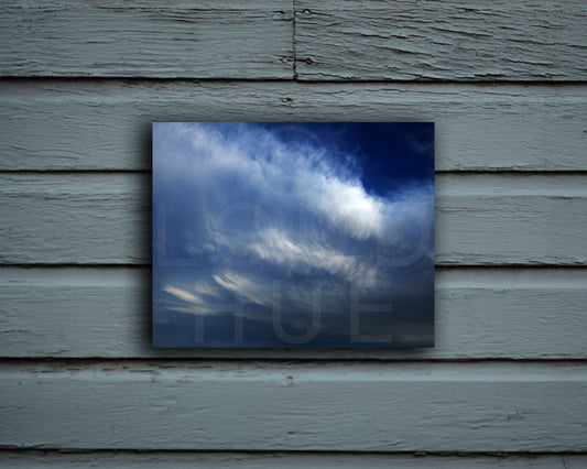 Nature photography print of glorious blue and white clouds shown mounted without a frame called Blue by Loud Hue