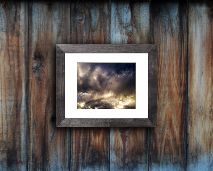 Nature photography print of a unique and impressive sunset shown mounted with a black frame called Galactic by Loud Hue.