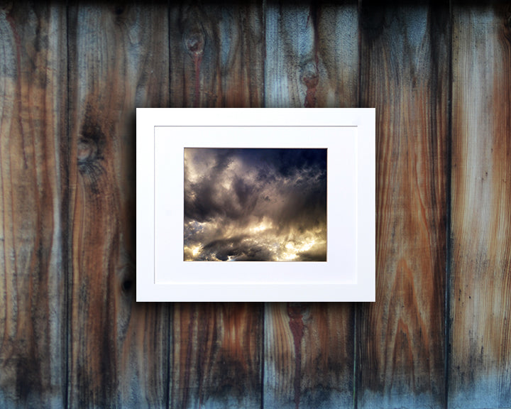 Nature photography print of a unique and impressive sunset shown mounted with a white frame called Galactic by Loud Hue.