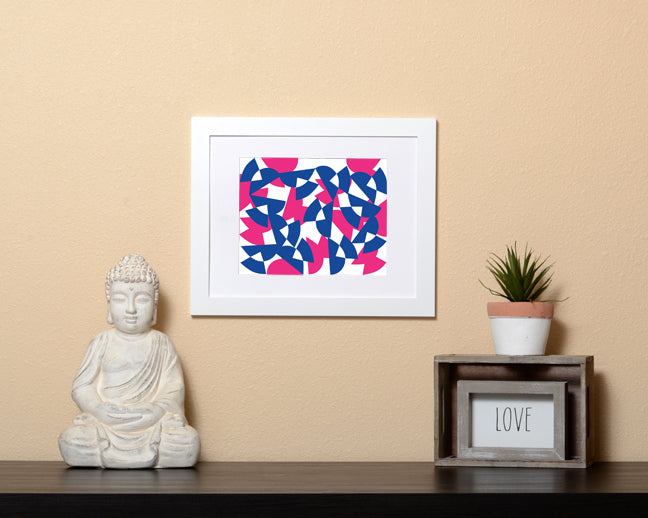 Pop art style Art Print in pink and blue overlapping shapes shown with a white frame called Bound by Loud Hue