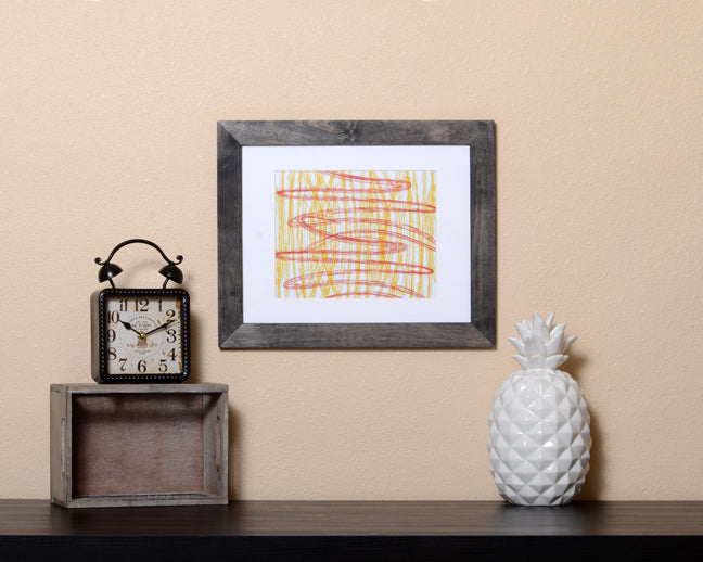 Modern Art Print of red and yellow horizontal and vertical lines with a paintbrush effect shown in a black framed called Dash by Loud Hue