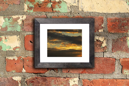 Nature photography print of a glowing autumn sunset mounted with a black frame called Aureola by Loud Hue