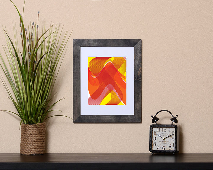 Art Print of a flowing blend of yellow and orange colors and textures shown in a black frame called Flow by Loud Hue