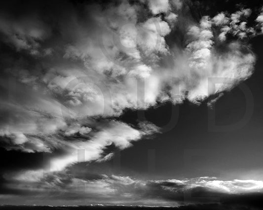 Black and White photographic print of a dramatic sky called Luminous by Loud Hue