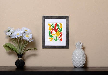 Art Print with red, green and yellow abstract shapes and black lines shown with a black frame called Music by Loud Hue