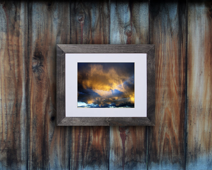 Beautiful nature photo of an unusual and glorious sunset shown with a black frame called Nebula by Loud Hue