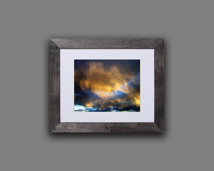 Beautiful nature photo of an unusual and glorious sunset shown mounted with a frame called Nebula by Loud Hue