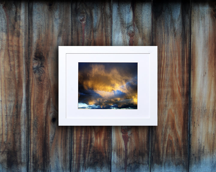 Beautiful nature photo of an unusual and glorious sunset shown with a white frame called Nebula by Loud Hue