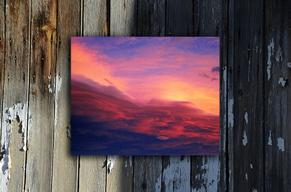 Nature photography print of a luminous blue, pink, yellow and red sunset shown mounted without a frame called Purple by Loud Hue