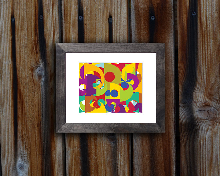 Pop art style Art Print of bold and colorful geometric shapes shown with black frame called Puzzle by loud Hue