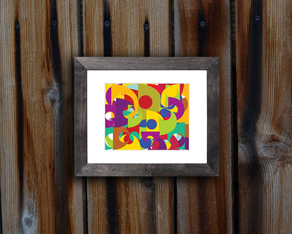 Pop art style Art Print of bold and colorful geometric shapes shown with black frame called Puzzle by loud Hue