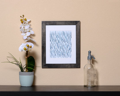 Art Print of raindrops in hues of blue with a brushstroke effect in black frame called Rain by Loud Hue