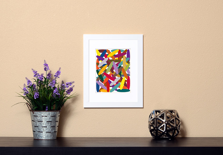 Colorful Art Print of oval shapes crisscrossing each other with white frame called Wild by Loud Hue