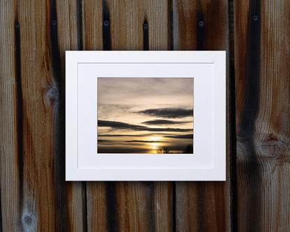 Nature photography print of a peaceful and serene winter sunset shown with a white frame called Flawless by Loud Hue