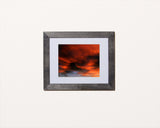 Colorful nature photography print of a fiery sunset with black frame called Burst by Loud Hue