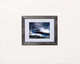 Dramatic nature photography print of a cloudy sky in black frame called Cotton by Loud Hue