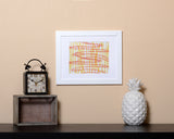 Modern Art Print with horizontal and vertical abstract lines in earthy colors with white frame called Dash by Loud Hue