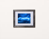 Beautiful nature photography print of a blue sky with black frame called Ocean by Loud Hue
